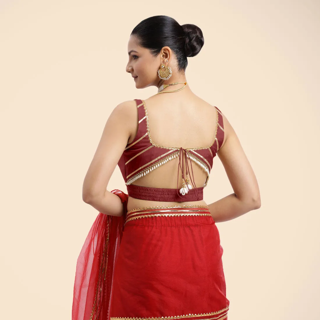 Arya x Tyohaar | Auburn Red Sleeveless FlexiFit™ Saree Blouse with Square Neck and Back Window Embeliished with Golden Gota and Pearl Lace