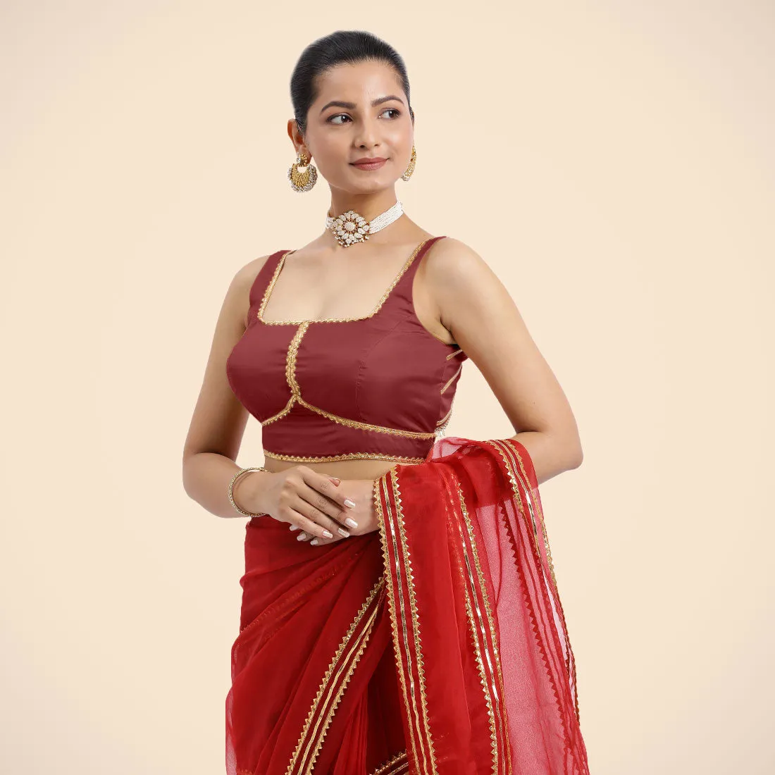 Arya x Tyohaar | Auburn Red Sleeveless FlexiFit™ Saree Blouse with Square Neck and Back Window Embeliished with Golden Gota and Pearl Lace