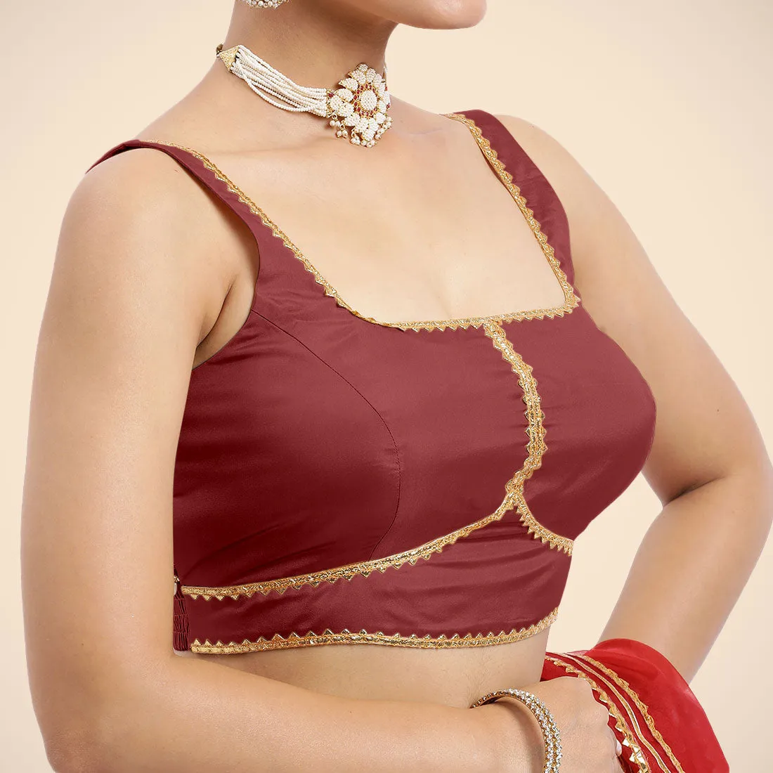 Arya x Tyohaar | Auburn Red Sleeveless FlexiFit™ Saree Blouse with Square Neck and Back Window Embeliished with Golden Gota and Pearl Lace