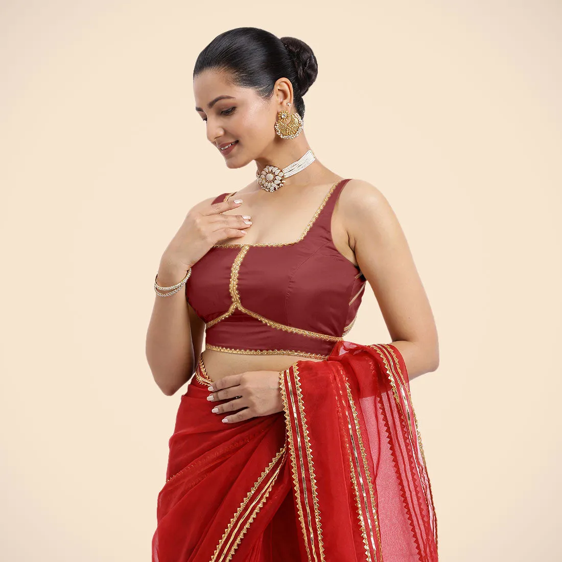 Arya x Tyohaar | Auburn Red Sleeveless FlexiFit™ Saree Blouse with Square Neck and Back Window Embeliished with Golden Gota and Pearl Lace