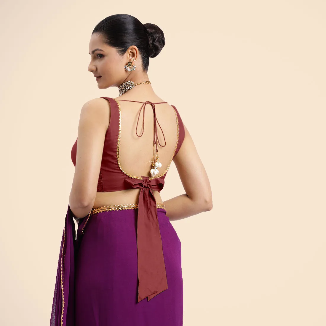 Raisa x Tyohaar | Auburn Red Sleeveless FlexiFit™ Saree Blouse with V Neckline with Golden Gota Lace Embellishment and Back Cut-out with Tie-Up