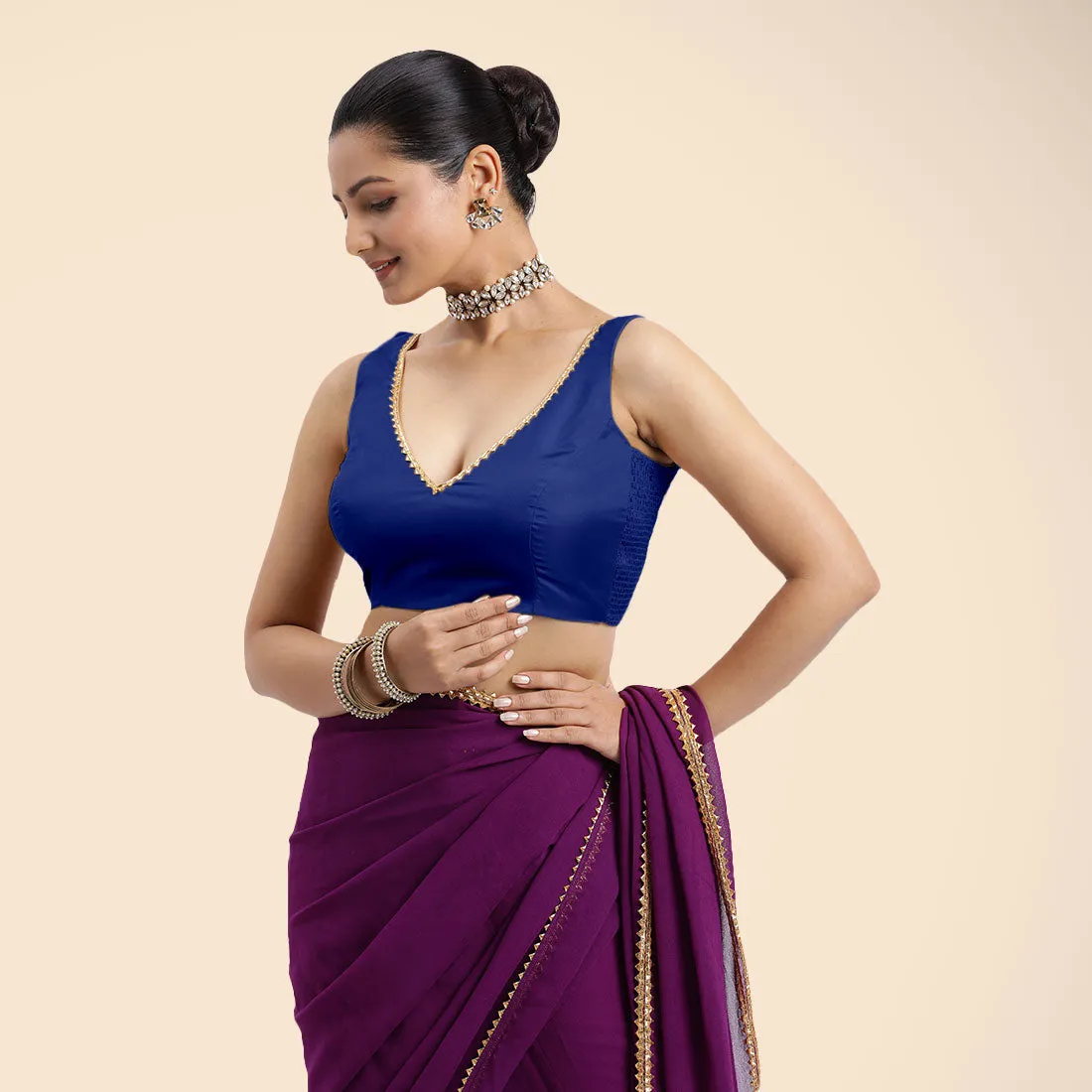 Raisa x Tyohaar | Cobalt Blue Sleeveless FlexiFit™ Saree Blouse with V Neckline with Golden Gota Lace Embellishment and Back Cut-out with Tie-Up