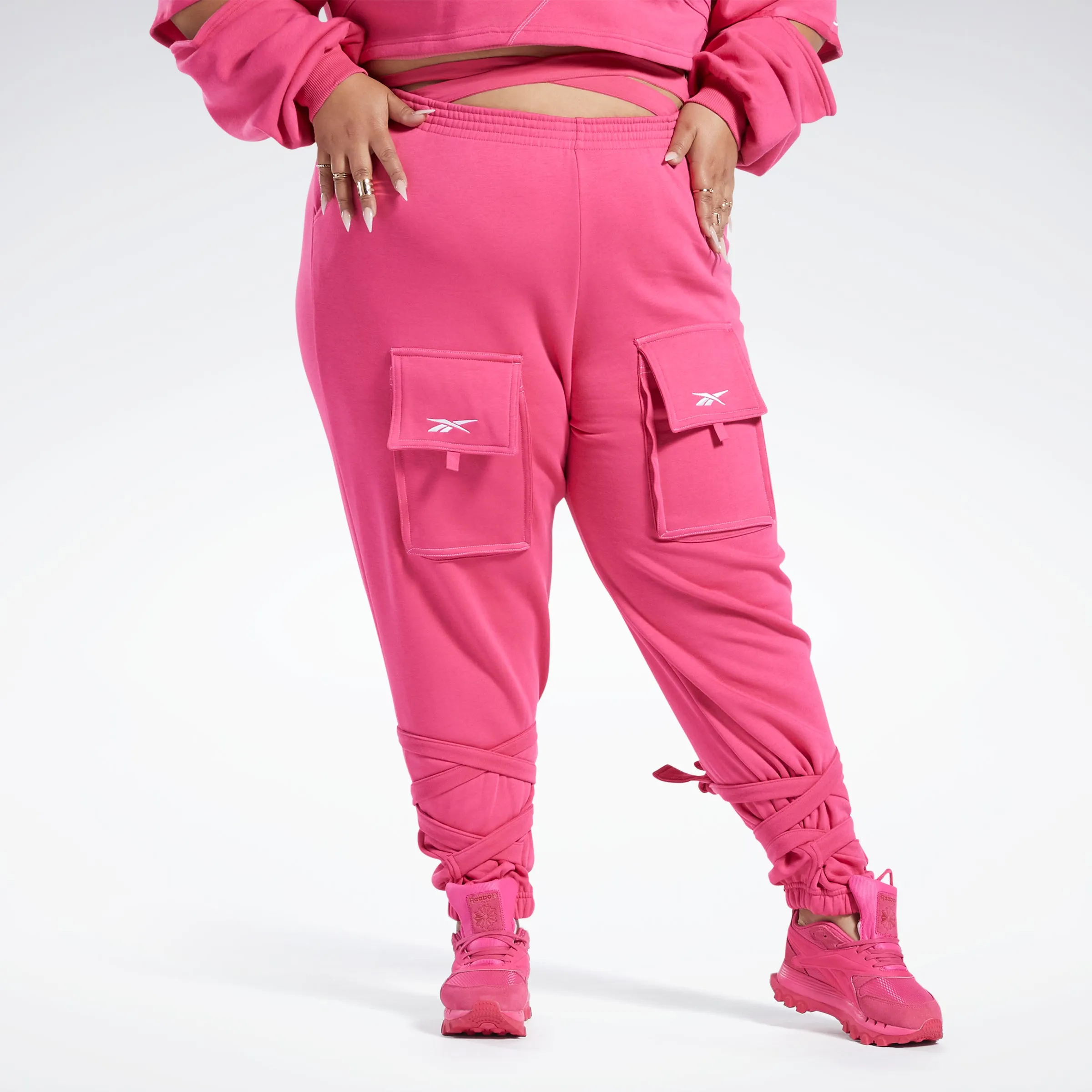 Reebok Apparel Women Cardi B Knit Joggers (Plus Size) Pnkfus