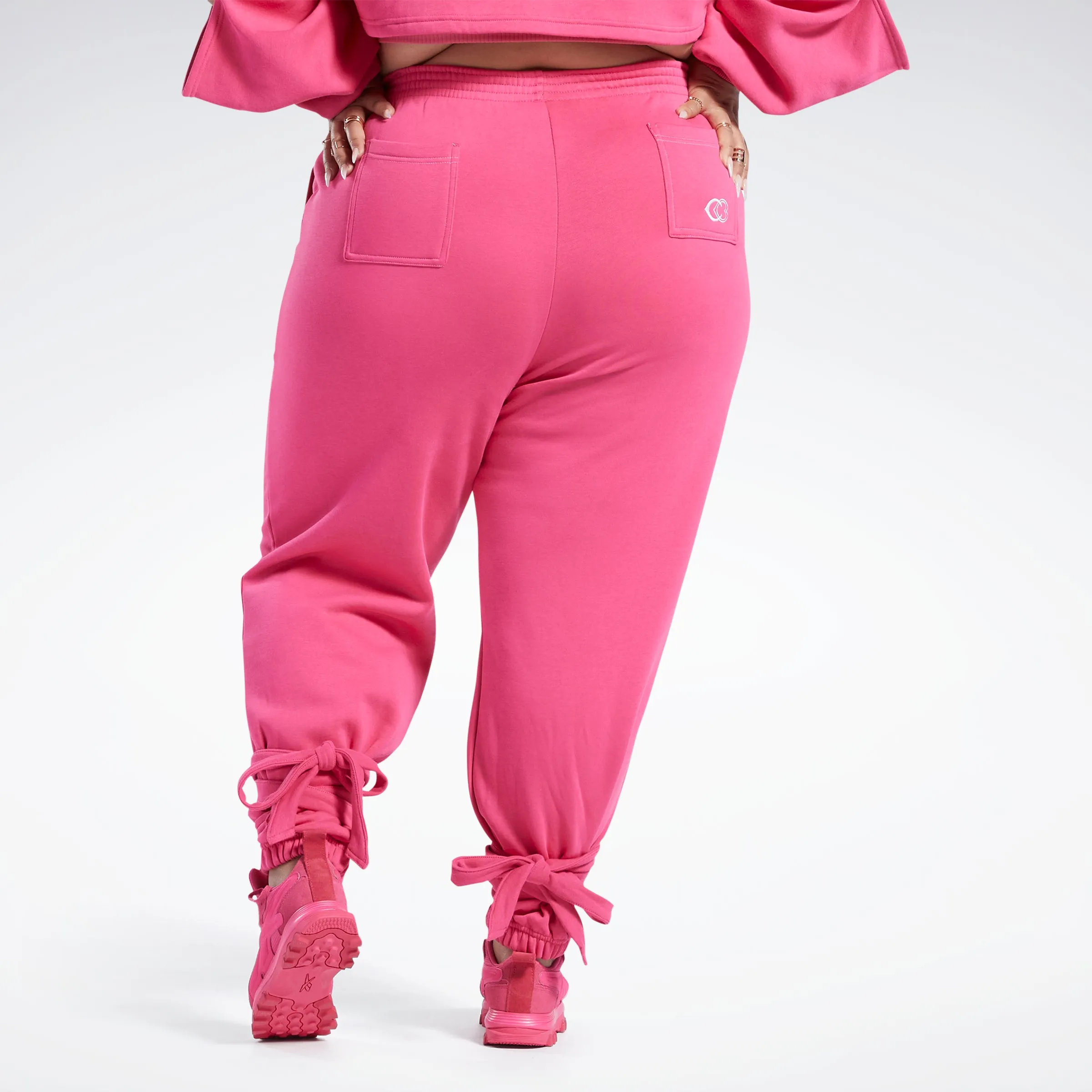 Reebok Apparel Women Cardi B Knit Joggers (Plus Size) Pnkfus